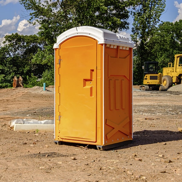 how often are the portable restrooms cleaned and serviced during a rental period in Coal County